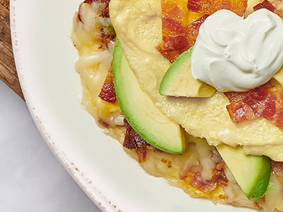 Bacon, avocado and Monterey Jack. Topped with sour cream and served with a side of housemade Pico de gallo.