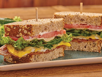 The classic BLT plus two over-hard cage-free eggs, Monterey Jack and mayo on our artisan whole grain.