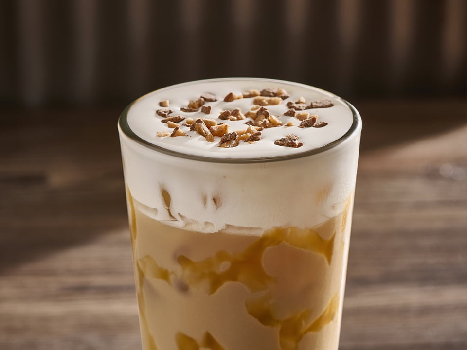 Salted caramel and honey topped with a sweet cream cold foam and toffee crumbles.
