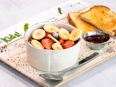 Non-fat vanilla Greek yogurt topped with our housemade granola with almonds, bananas, strawberries, blueberries and sprinkled with powdered cinnamon sugar. Served with sourdough toast.