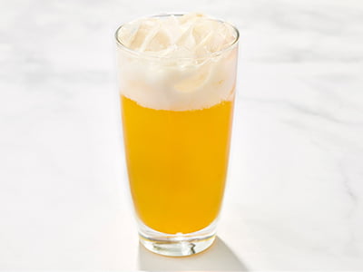 Tangerine, pineapple, organic ginger and cane sugar topped with vanilla coconut milk.